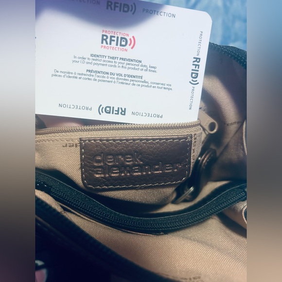 #18. NWT beautiful, black and brown leather/suede Crossbody travel secure purse - Picture 4 of 5